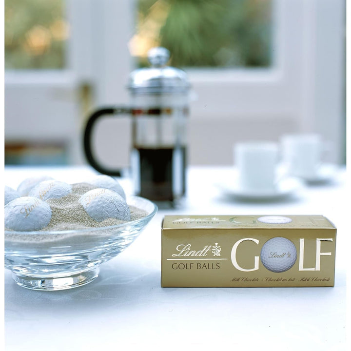 Lindt Schokolade - Golfbälle | 110 G | Drei Golfbälle Aus Lindt Vollmilch-Schokolade Mit Nougatcremefüllung Und Waffelstückchen | Pralinengeschenk | Geschenk Für Golfer | Schokoladengeschenk Naty Shop